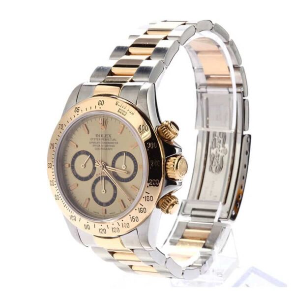 Rolex-Daytona-Cosmograph-Replica-Left.jpg Rolex Daytona Cosmograph Yellow Gold Champagne Dial 16523 Replica